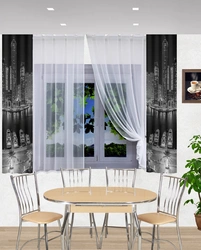 White curtains in the kitchen in the interior photo