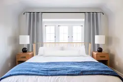 Дизайн спальни если кровать напротив окна