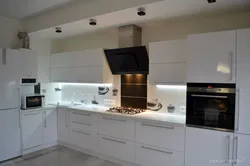 Kitchen with large hood photo