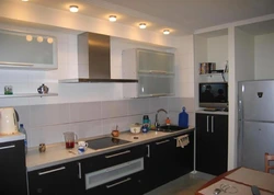 Kitchen With Large Hood Photo