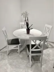 Light chairs in the kitchen interior