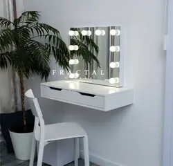 Ladies table with mirror in the bedroom with lighting photo