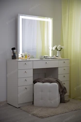 Ladies table with mirror in the bedroom with lighting photo