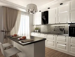 Black appliances in the interior of a light kitchen