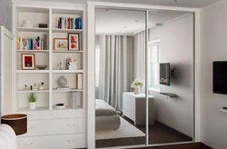 Белый шкаф в интерьере гостиной фото