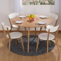 Круглы стол у інтэр'еры кухні сучасны
