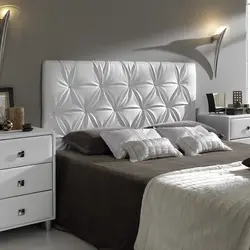 Bedroom design with soft headboard photo