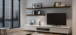 Shelves above the TV in the living room in the interior