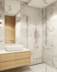 Bathroom design with wood and marble tiles photo