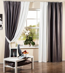 Two-color curtains in the living room interior photo