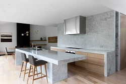 White kitchen with artificial stone photo