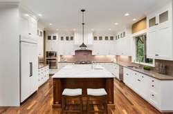 White kitchen and wooden table photo