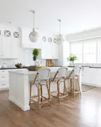 White kitchen and wooden table photo