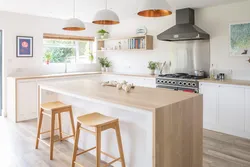 White kitchen and wooden table photo