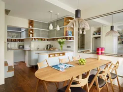 White kitchen and wooden table photo