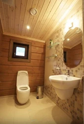 Toilet With Bathtub In A Wooden House Photo Design