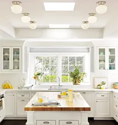 Kitchen design in a modern corner style with a window in the house