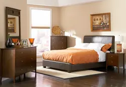 Дизайн спальни с рыжей мебелью