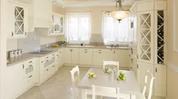 Photo Of A Kitchen With A Window In Light Colors