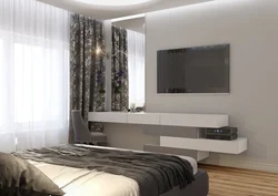 Bedroom interior with bed and tv