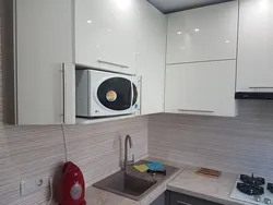 Kitchen design 6 square meters with refrigerator and washing machine