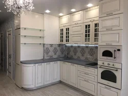 Corner white kitchen in the interior photo