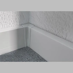 Plinth for bathtub made of tiles photo