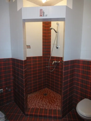 Photo of a bathroom with a tiled shower