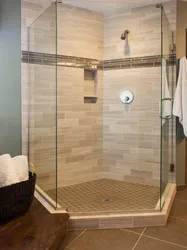 Photo Of A Bathroom With A Tiled Shower