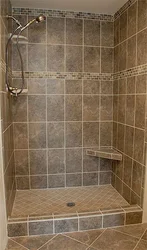 Photo Of A Bathroom With A Tiled Shower