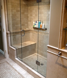 Photo Of A Bathroom With A Tiled Shower