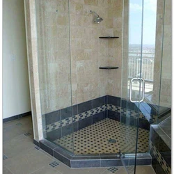Photo of a bathroom with a tiled shower