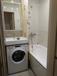 Lavabo və paltaryuyan maşın olan kiçik bir hamamın dizaynı