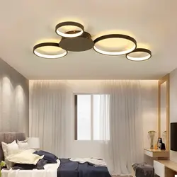 Suspended ceiling with light bulbs in the ceiling in the bedroom photo
