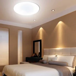 Suspended ceiling with light bulbs in the ceiling in the bedroom photo