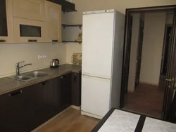 Photo Of Putting A Refrigerator In The Kitchen