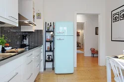 Photo Of Putting A Refrigerator In The Kitchen
