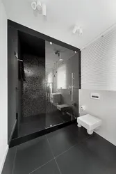 Bath design dark floor light walls