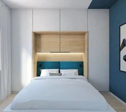 Bed Between Wardrobes In Bedroom Design