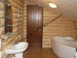 Bathroom design in a wooden house with tiles
