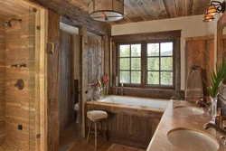 Photo of a bathroom in a wooden house