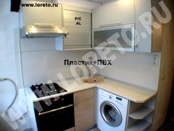 Corner kitchen for Khrushchev photo with refrigerator and washing machine