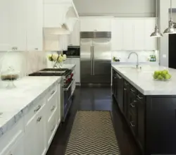 White kitchen dark floor design