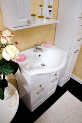 Bathroom sink with cabinet and mirror photo