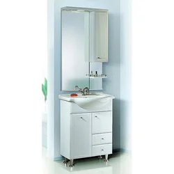 Bathroom Sink With Cabinet And Mirror Photo