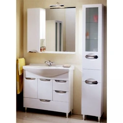 Bathroom sink with cabinet and mirror photo