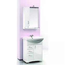 Bathroom sink with cabinet and mirror photo