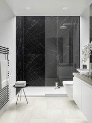 Black and white marble tiles in the bathroom photo design