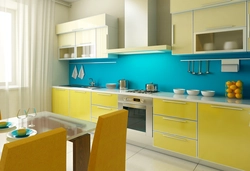 Yellow-blue kitchen in the interior photo