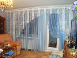 Curtain design for a living room with a balcony door on a ceiling cornice